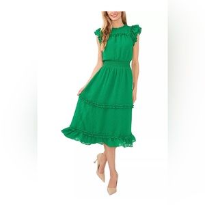 Women’s ruffled flutter sleeve swiss dot mini dress